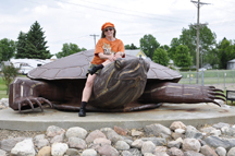 Karen Duquette on Rusty the Giant Turtle